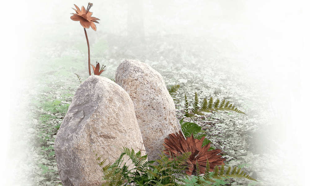grafzerk natuurbegraafplaats zwerfkeien met cortenstaal bloemen