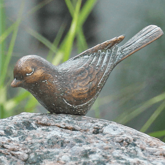 inspiratietuin grafzerken bronzen vogeltje