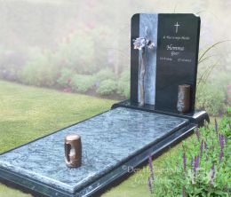 Exclusief grafmonument met bronzen grafaccessoires