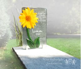Grafmonument van glas met een zonnebloem