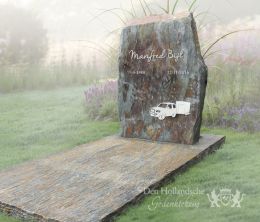 Grafmonument van leisteen met rvs decoraties