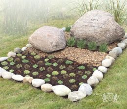 Natuurlijk grafmonument met zwerfkeien