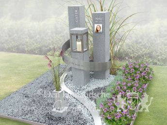 Breed grafmonument met grijze zuilen