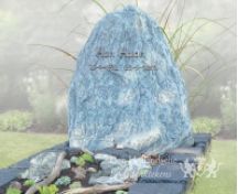 Grafmonument met blauw ruw natuursteen foto 2