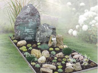 Grafmonument met ruwe stenen en smeltglas