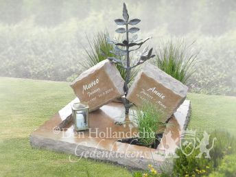 Kort grafmonument met bronzen boom