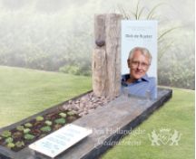 Modern glazen grafmonument met ruwe steensoorten foto 1