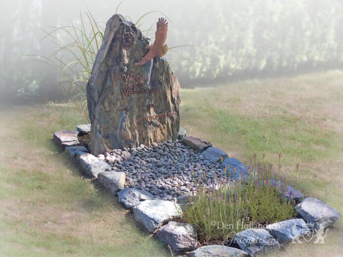 Natuurlijke grafsteen met vogel cortenstaal foto 1