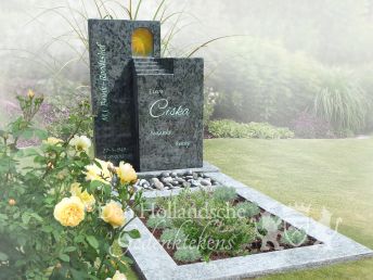 Natuursteen grafmonument met de hemelpoort