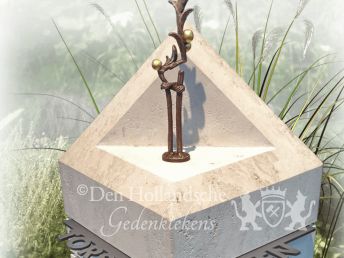 urnengraven-met-zuilen-bronzen-beeldje.png
