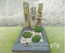 Zuilen grafmonument met leisteen omranding foto 2